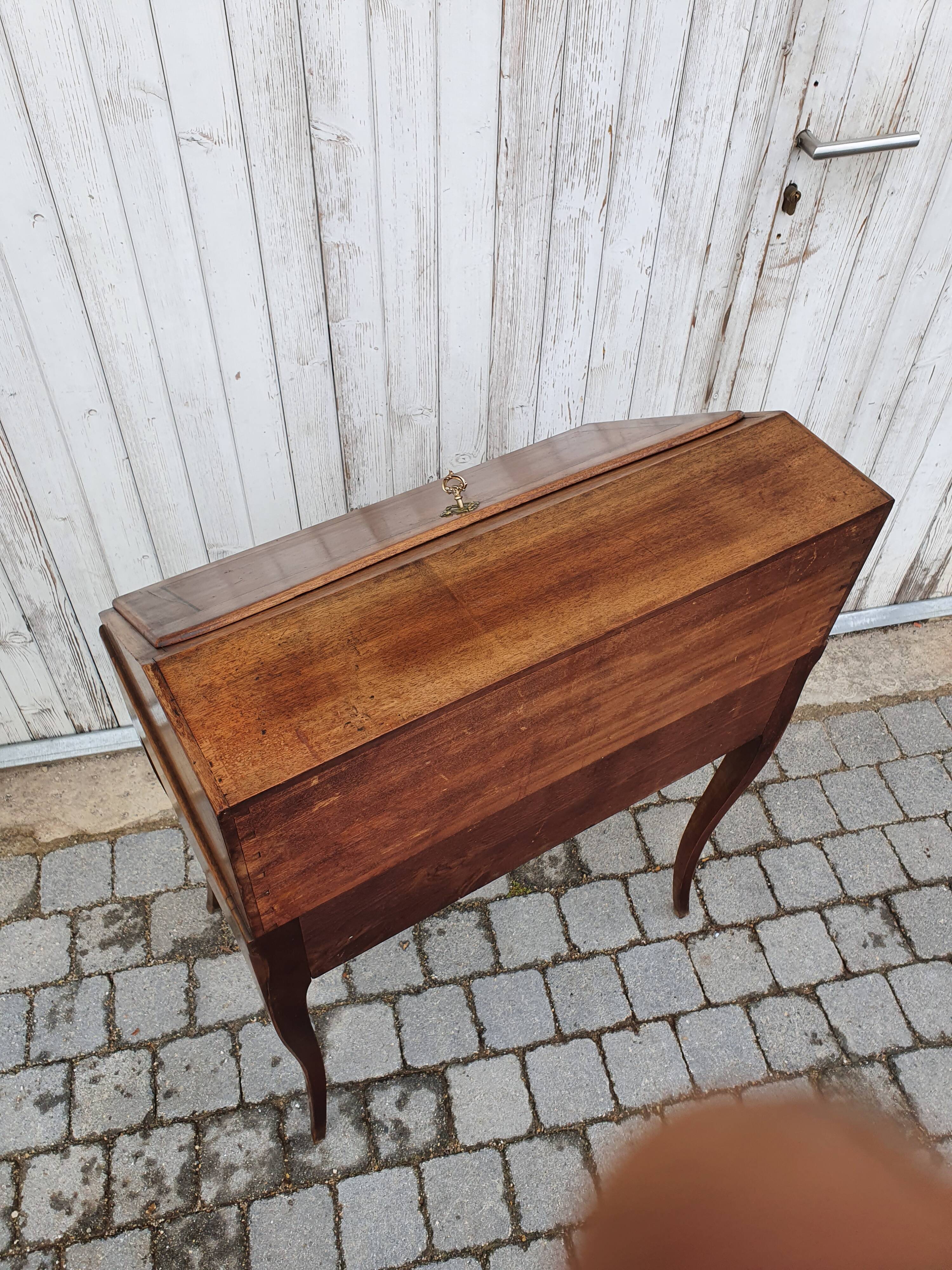 Former small secretary office with a walnut Louis XV