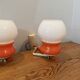 Pair of Space Age design wall lights in metal and vintage opaline.