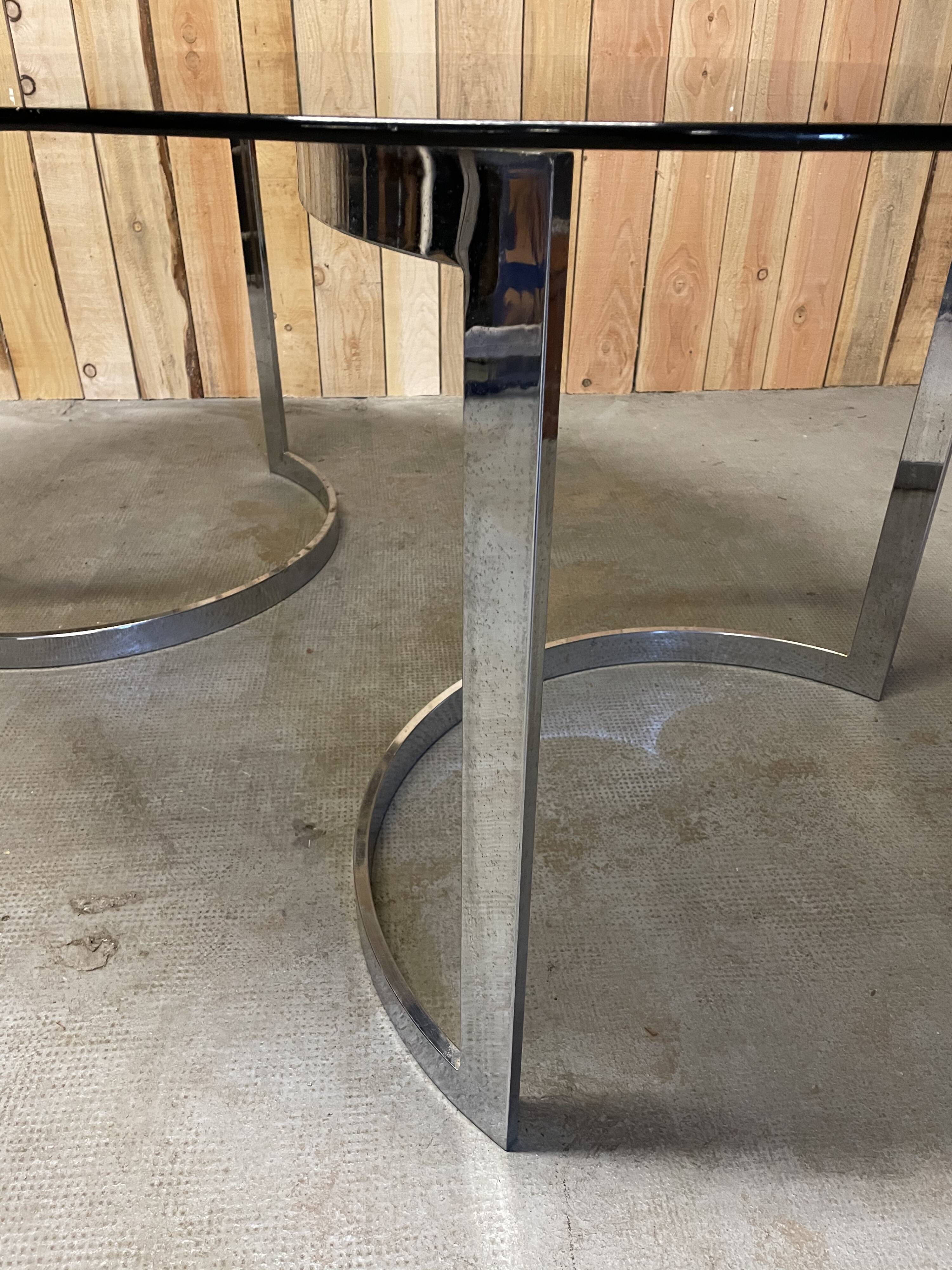 Glass oval dining table by Milo Baughman