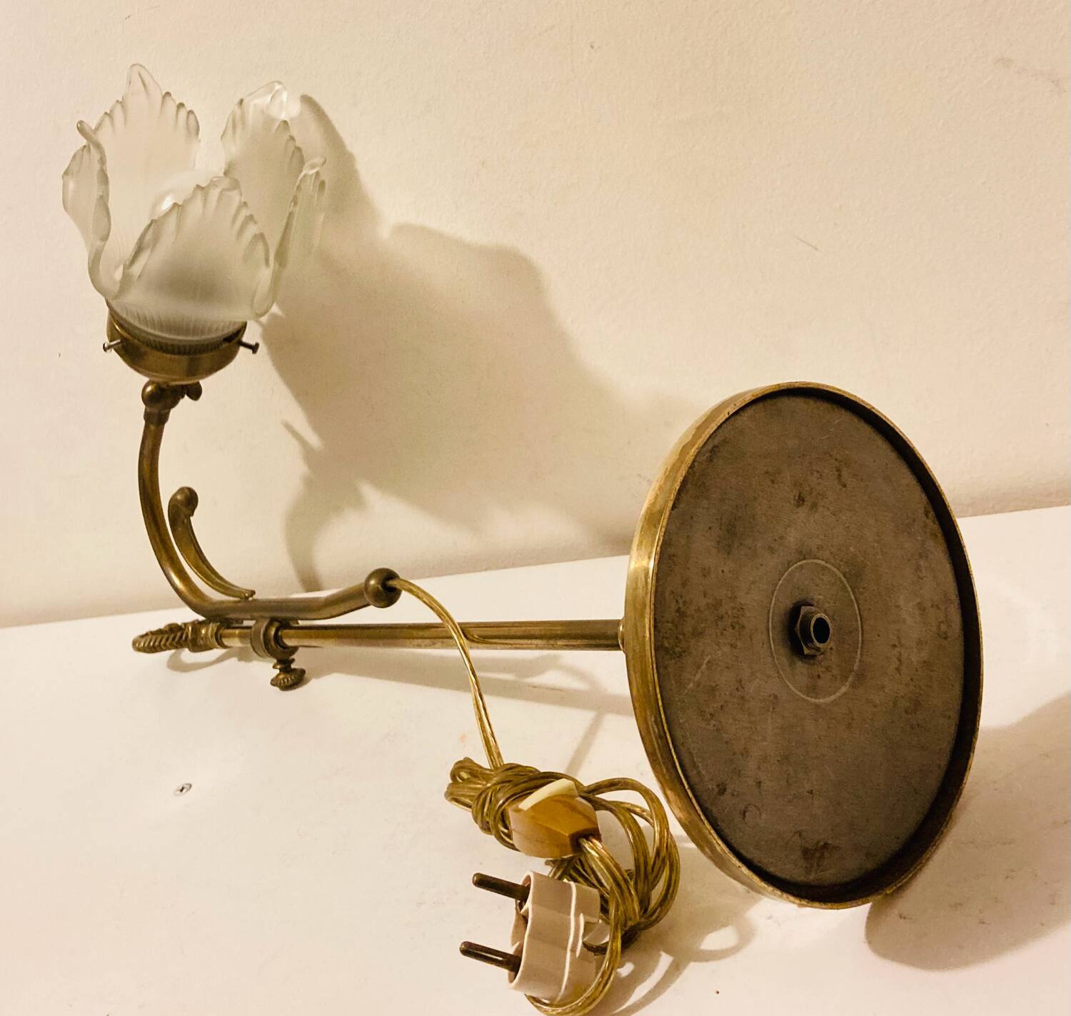 Brass table lamp with a glass shade