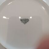 Set of 11 hollow porcelain plates