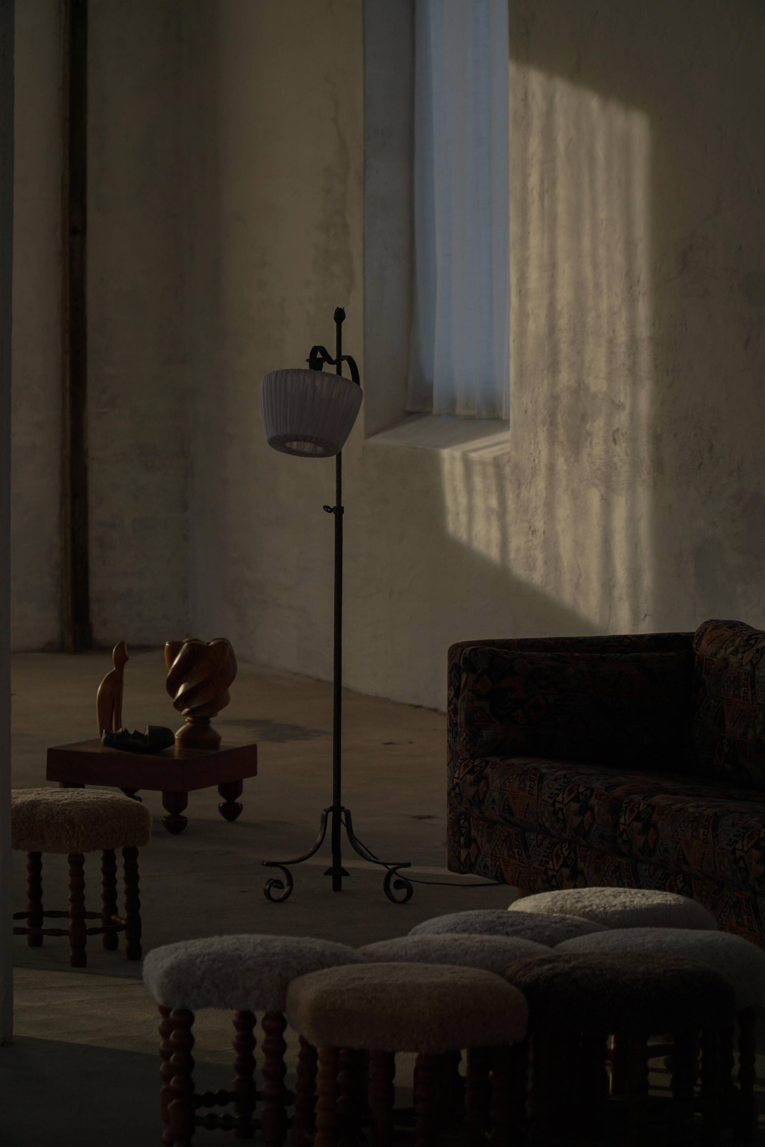 20th-century wrought iron floor lamp with swirling detail, Danish Art Deco.