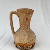 Terracotta jug covered with cork