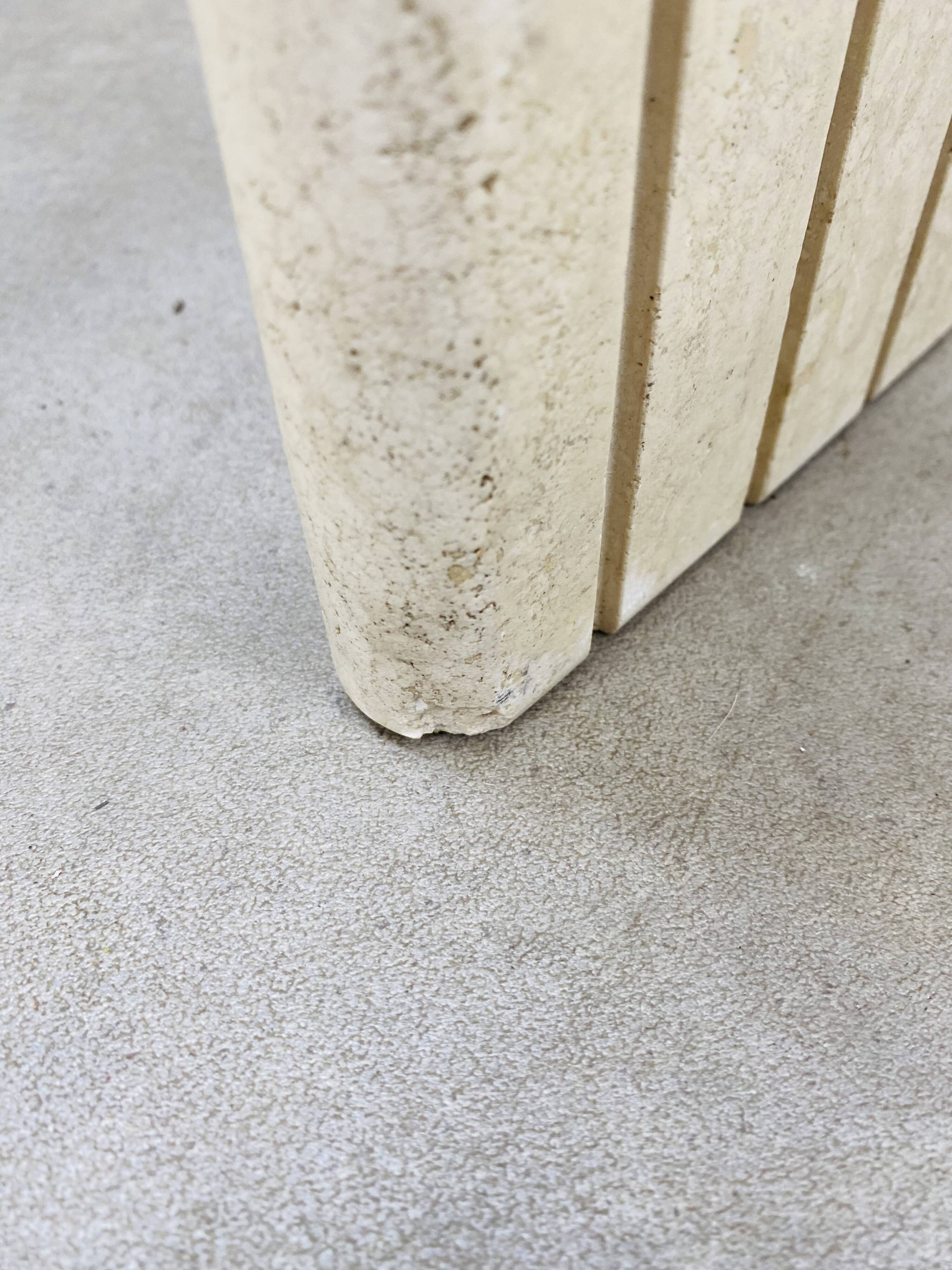 Travertine eye coffee table Roche Bobois