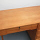 Bureau féminin des années 1950 en cendres