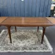 Rectangular extendable table in Scandinavian style made of teak.