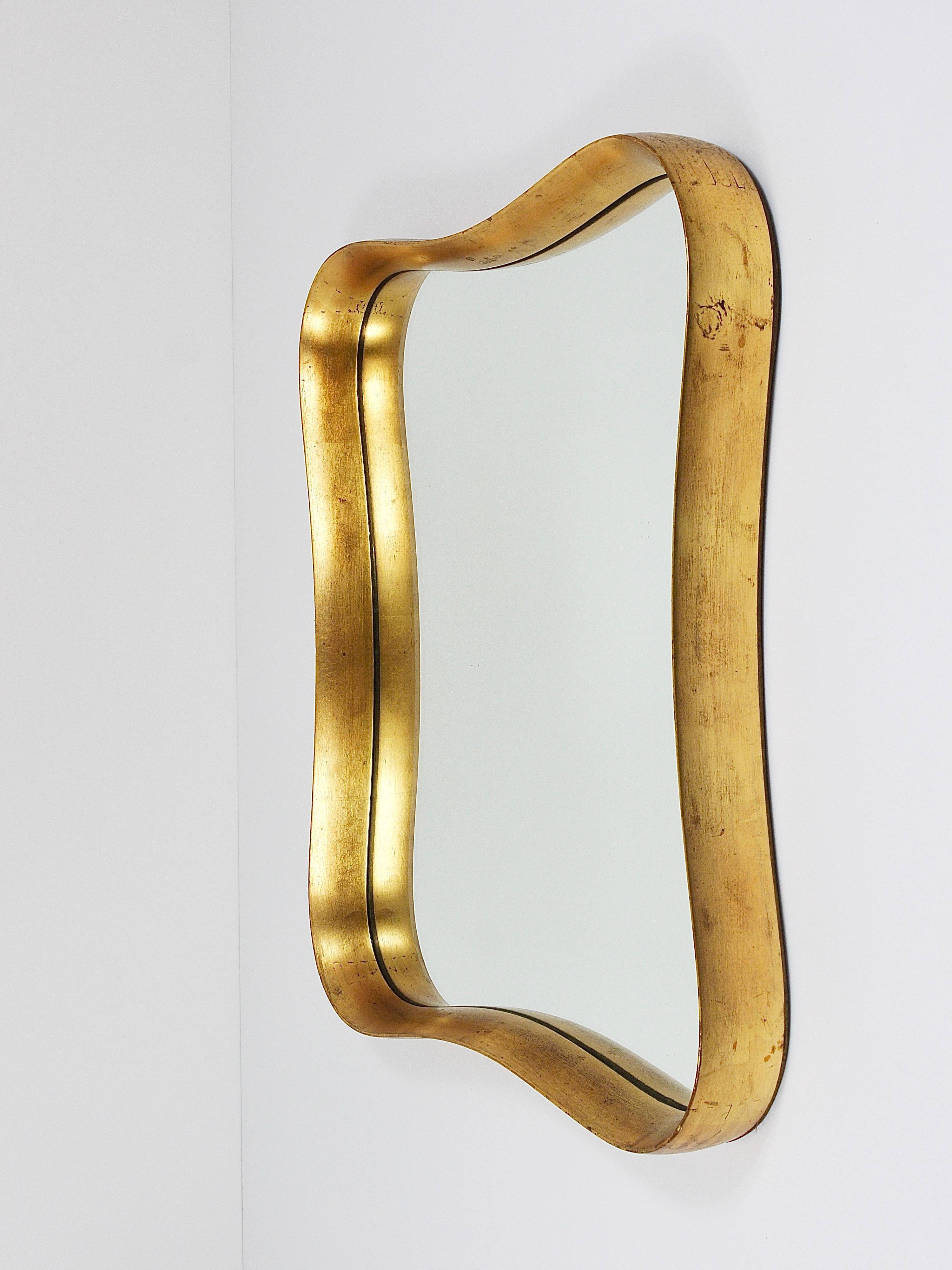 Golden wooden mirror in the style of Gio Ponti by Max Welz, Vienna, Austria, 1940s.