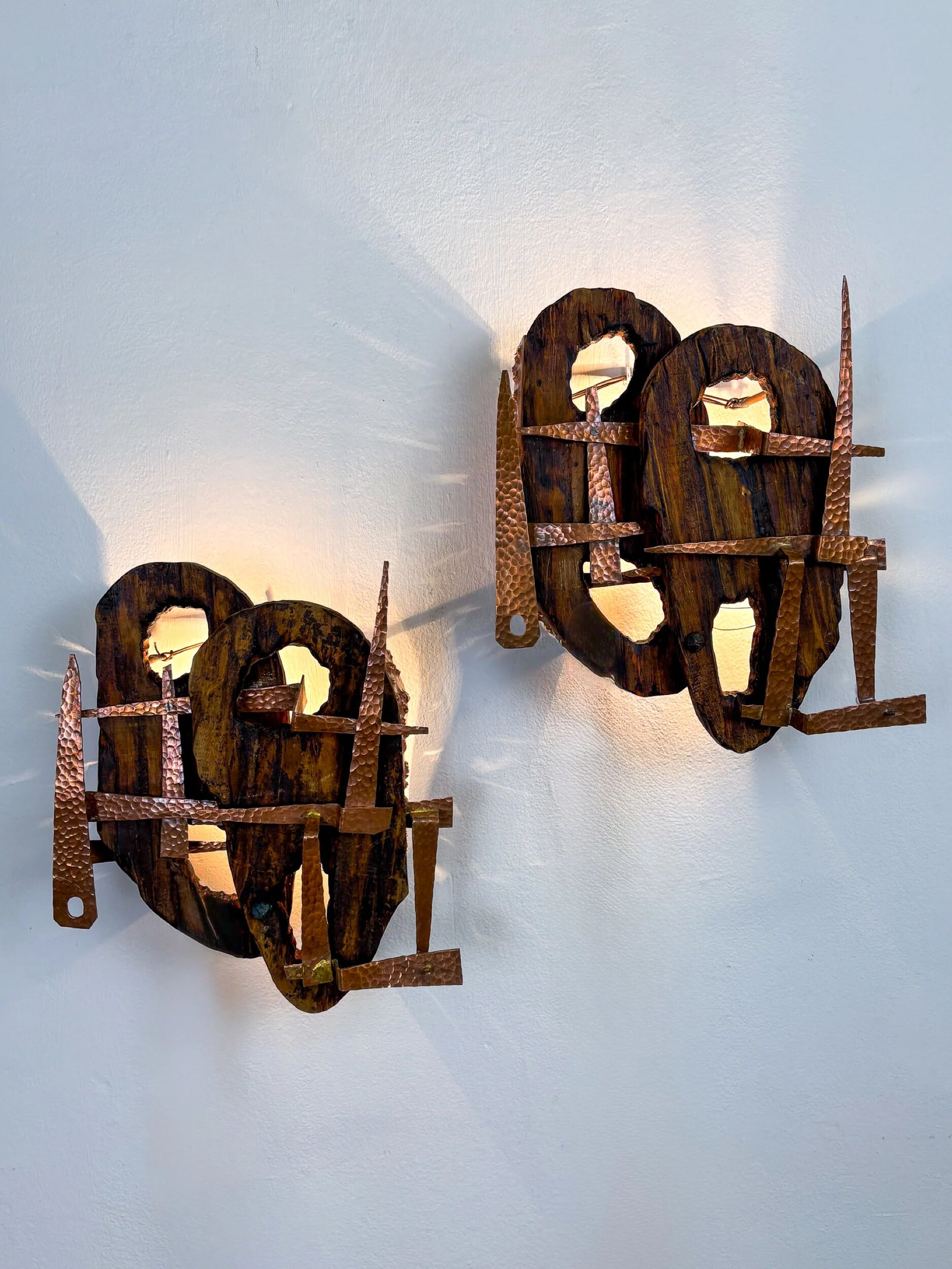 Pair of Brutalist wood & copper wall sconces, Italy, 1970s