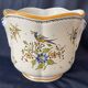 Earthenware cache-pot from Moustiers with bird and floral decoration, interior decor.