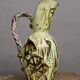 Ceramic jug with fish decoration
