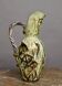 Ceramic jug with fish decoration