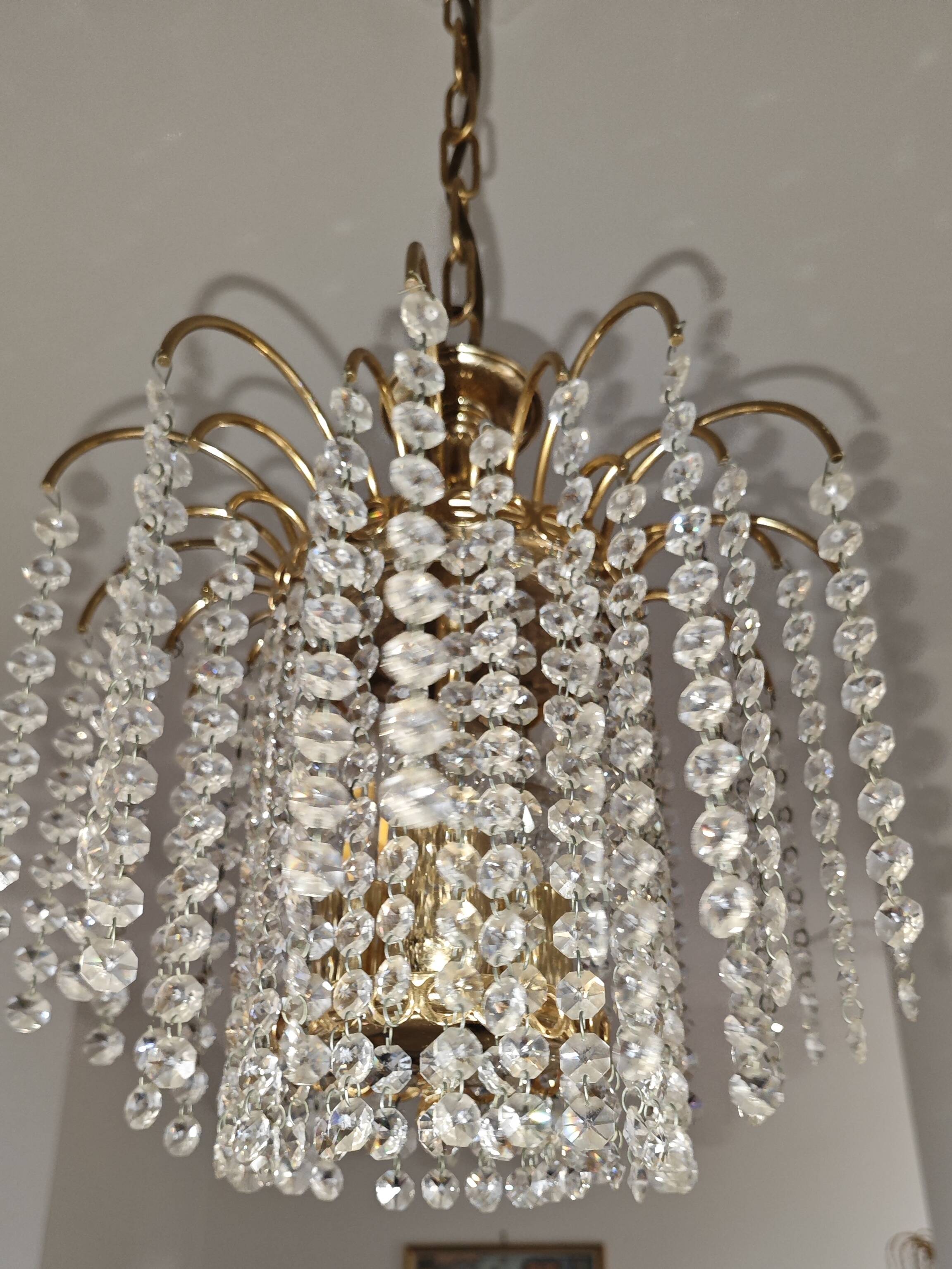 Brass cascading chandelier with crystals