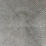 Blue crocheted bedspread and its vintage cushion