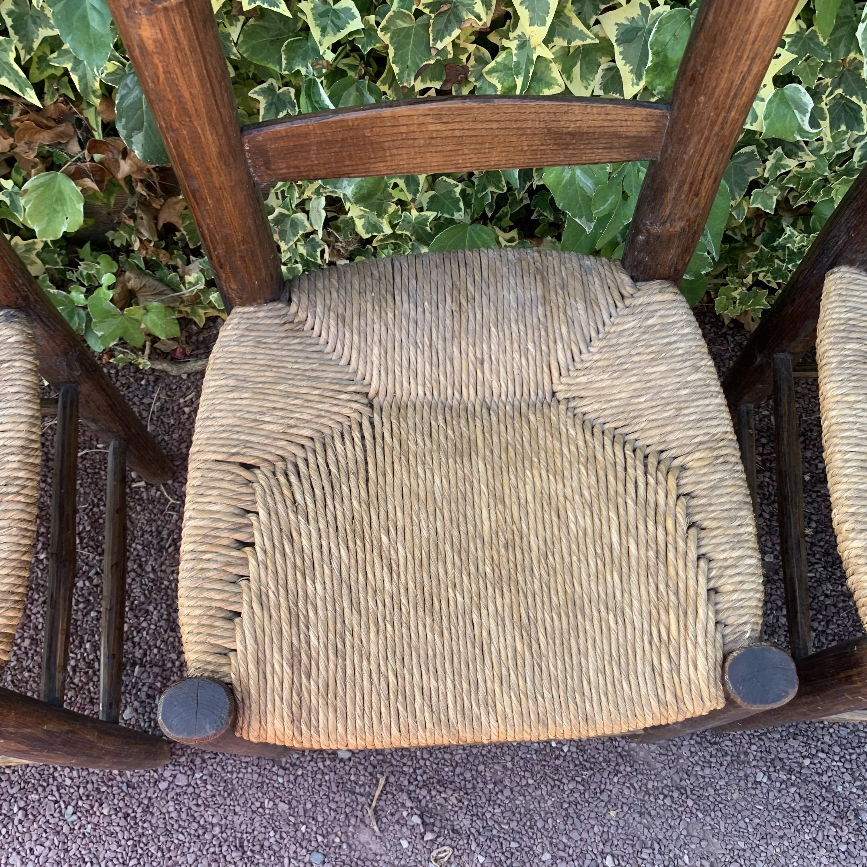 Set of 4 handcrafted rush chairs in solid oak.