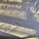 White woven cotton bedspread with fringes