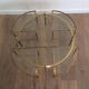 Round brass coffee table in neoclassical style