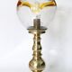 Table lamp in solid brass with a vintage 1970s glass globe.