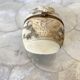 Ivory and brass owl and ermine box