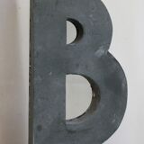 Letter of sign in zinc
