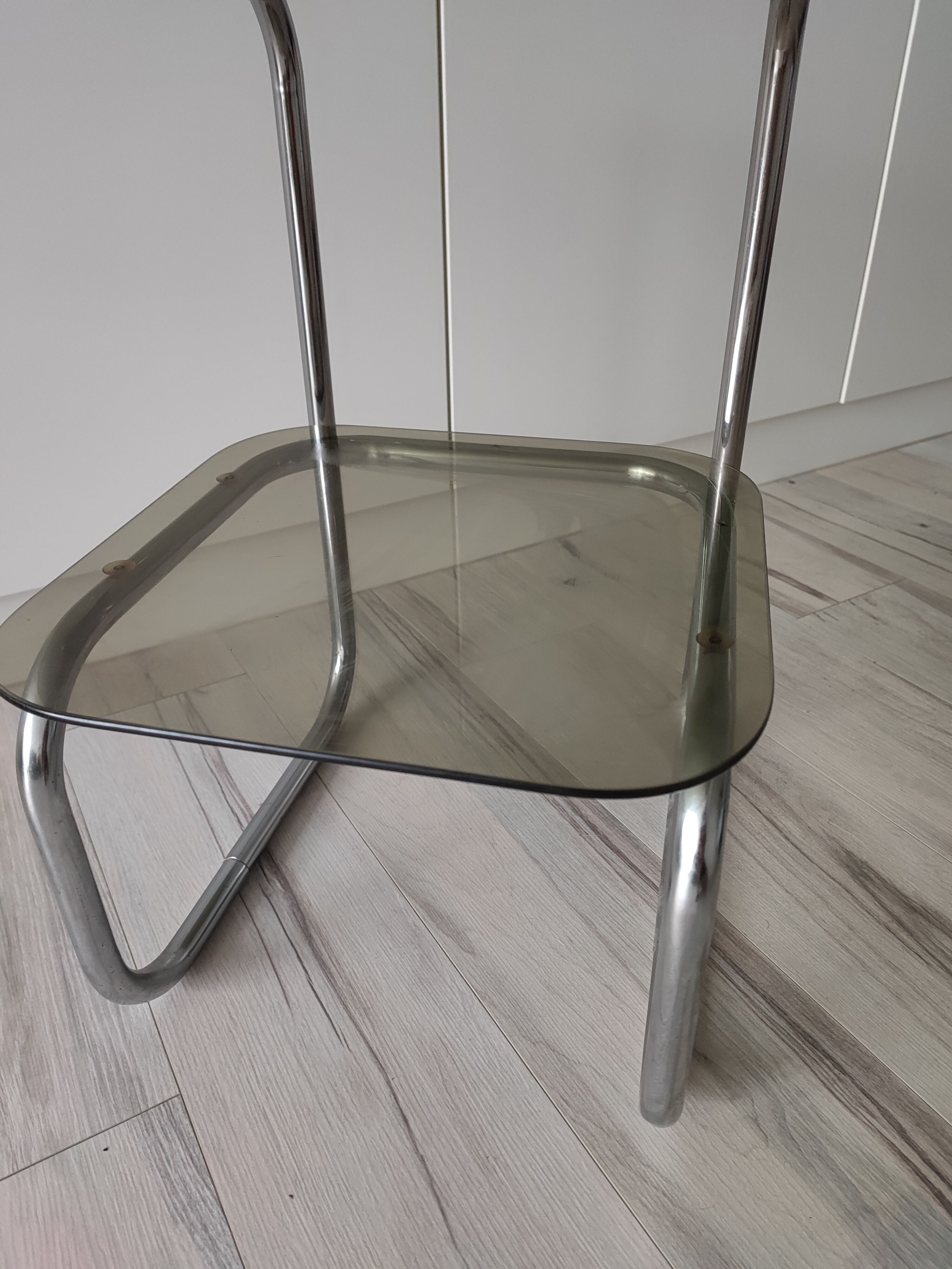 Side table or pedestal table in chrome and glass
