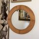 Round Scandinavian pine mirror from the 1970s.