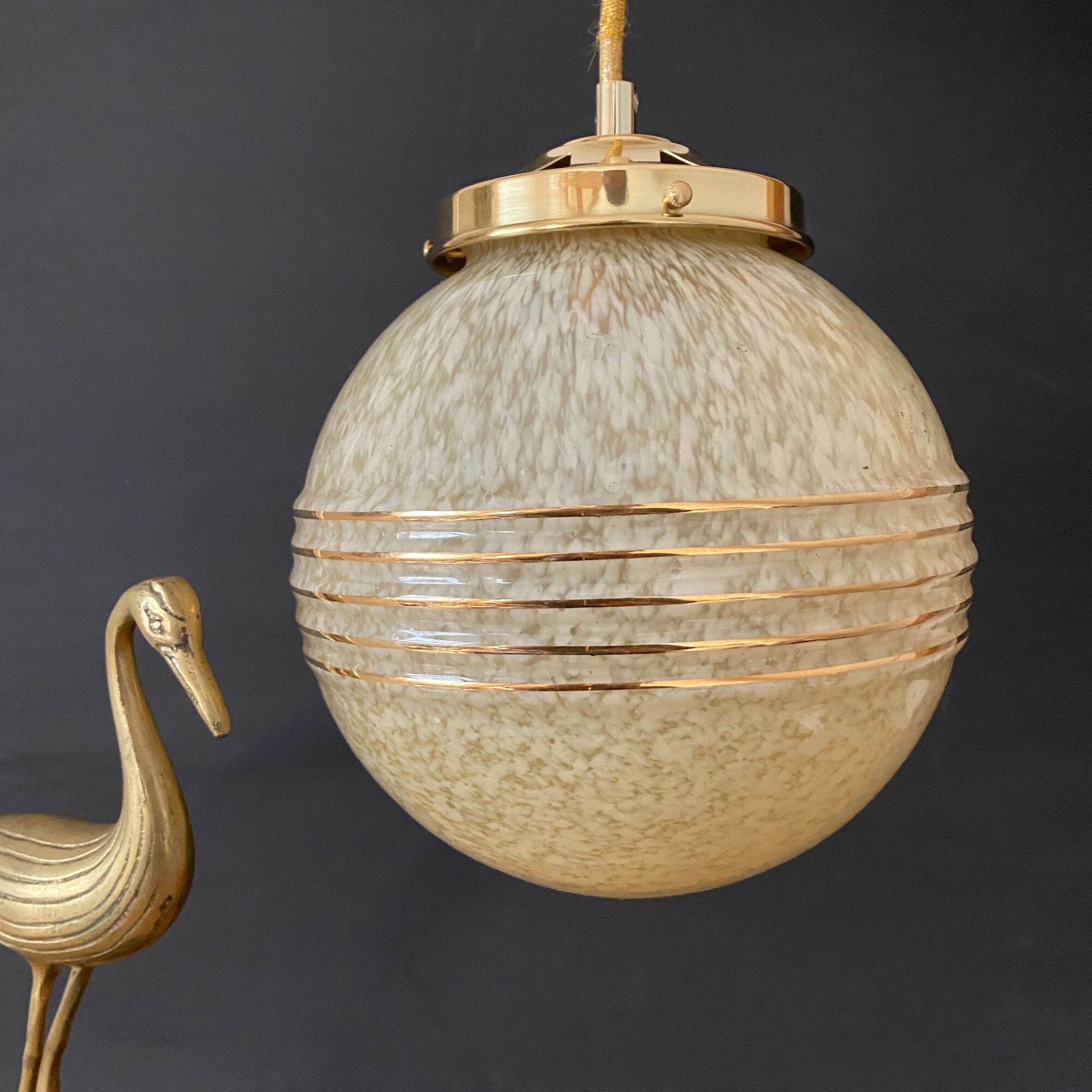 Vintage globe suspension in yellow and gold in Clichy glass