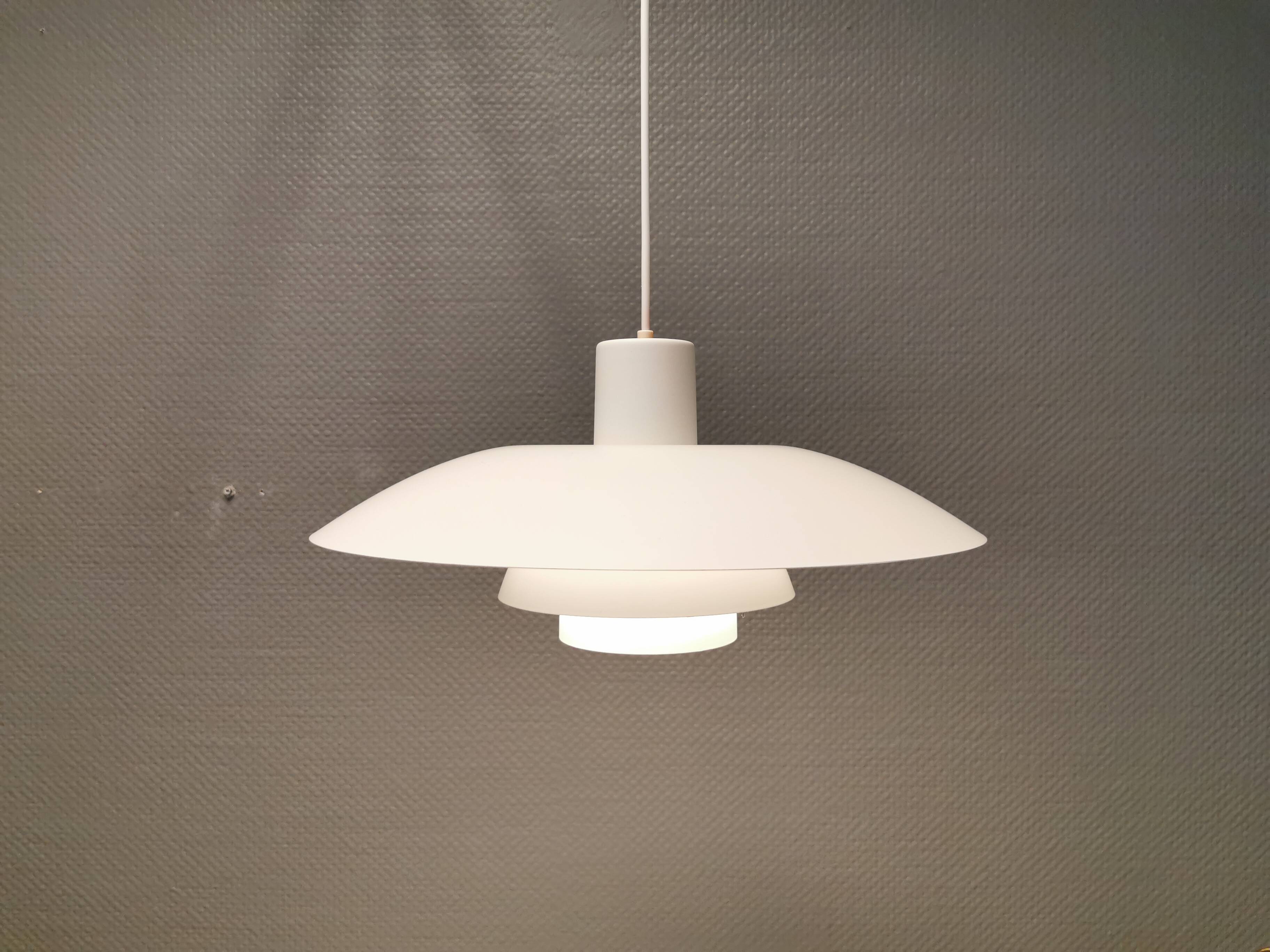 Beautiful older PH 4/3 hanging lamp, in white, with original orange suspension.