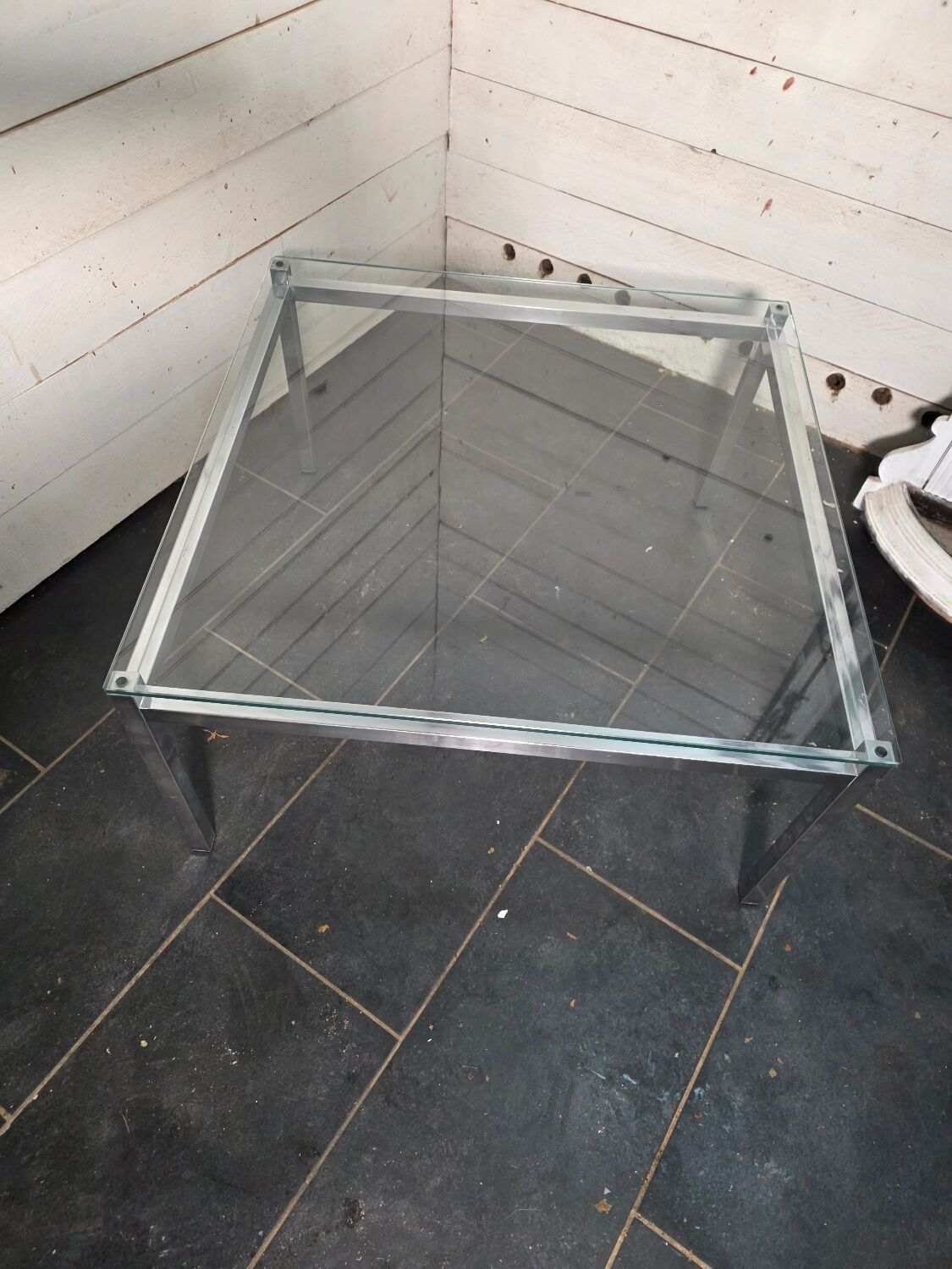 Chrome metal coffee table with a glass top from the 1970s.