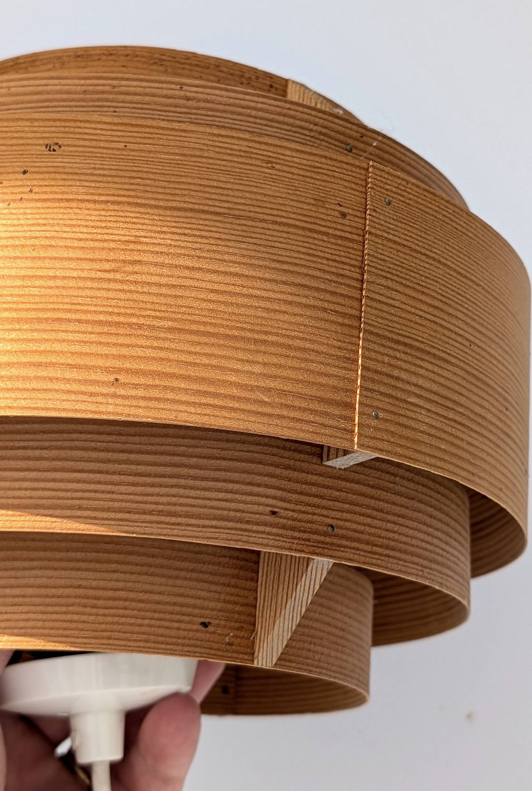 Suspension in pine veneer by Hans-Agne Jakobsson