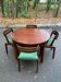 Scandinavian dining table and 4 Hans Olsen style chairs in teak and velvet.