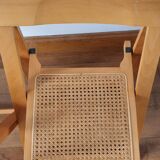 Pair of canned folding chairs.