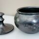 Black metal glazed ceramic bonbonnière, signed Jean Marais Vallauris