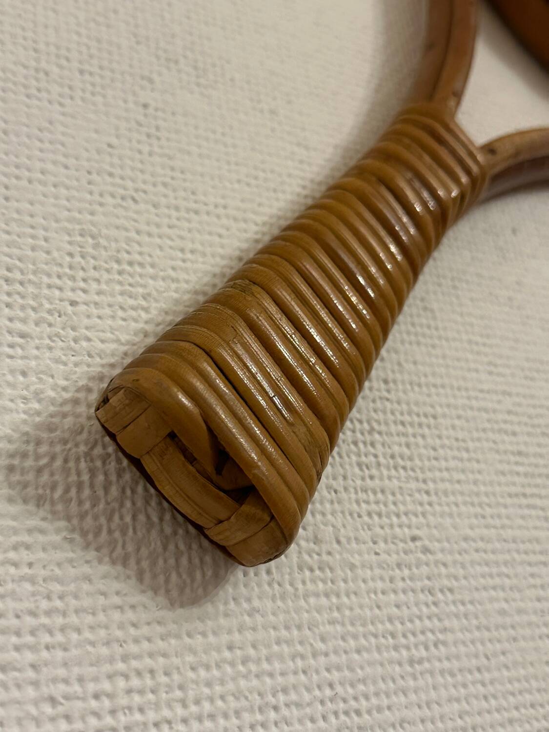 Vintage rattan tennis racket mirror