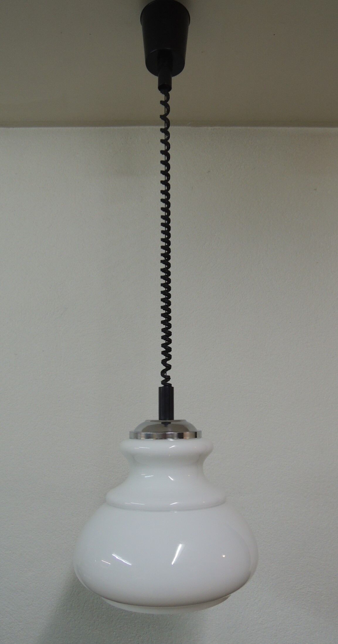 Vintage hanging rises and falls