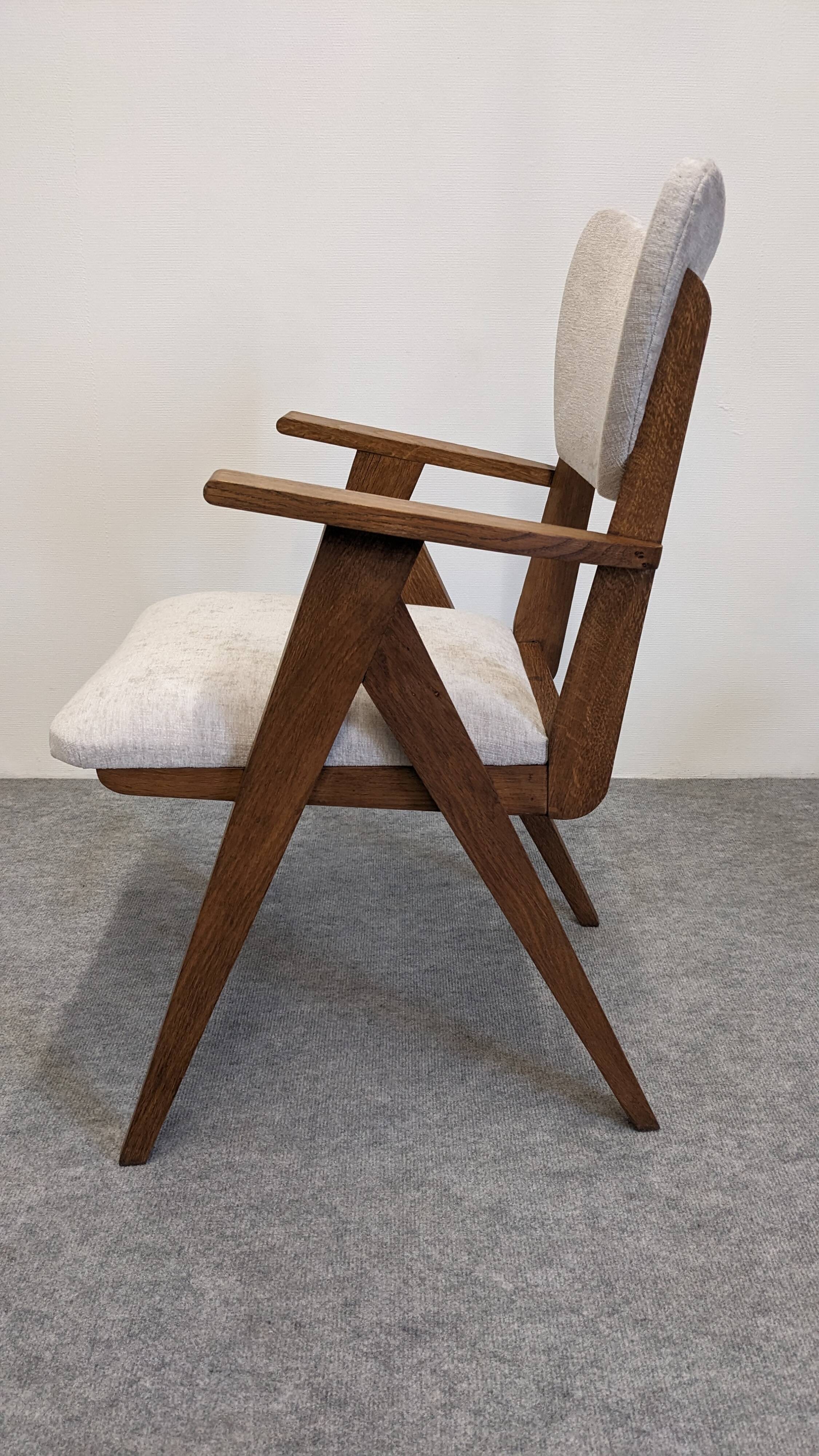 Pair of Scandinavian bridge armchairs in teak, Denmark circa 1950.