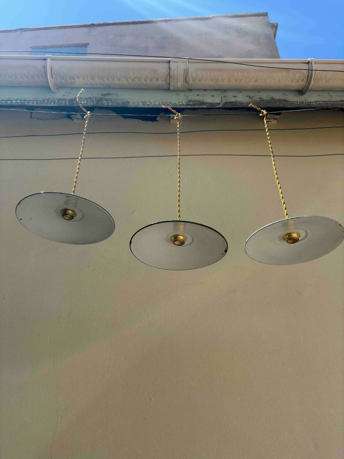 Lot of 3 vintage pendant lampshades in green and white enamelled sheet metal, industrial farm