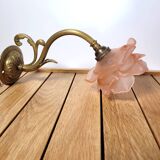 Old pink and golden brass wall lamp