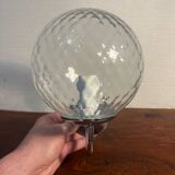 Delmas chrome wall light with chiseled glass globe