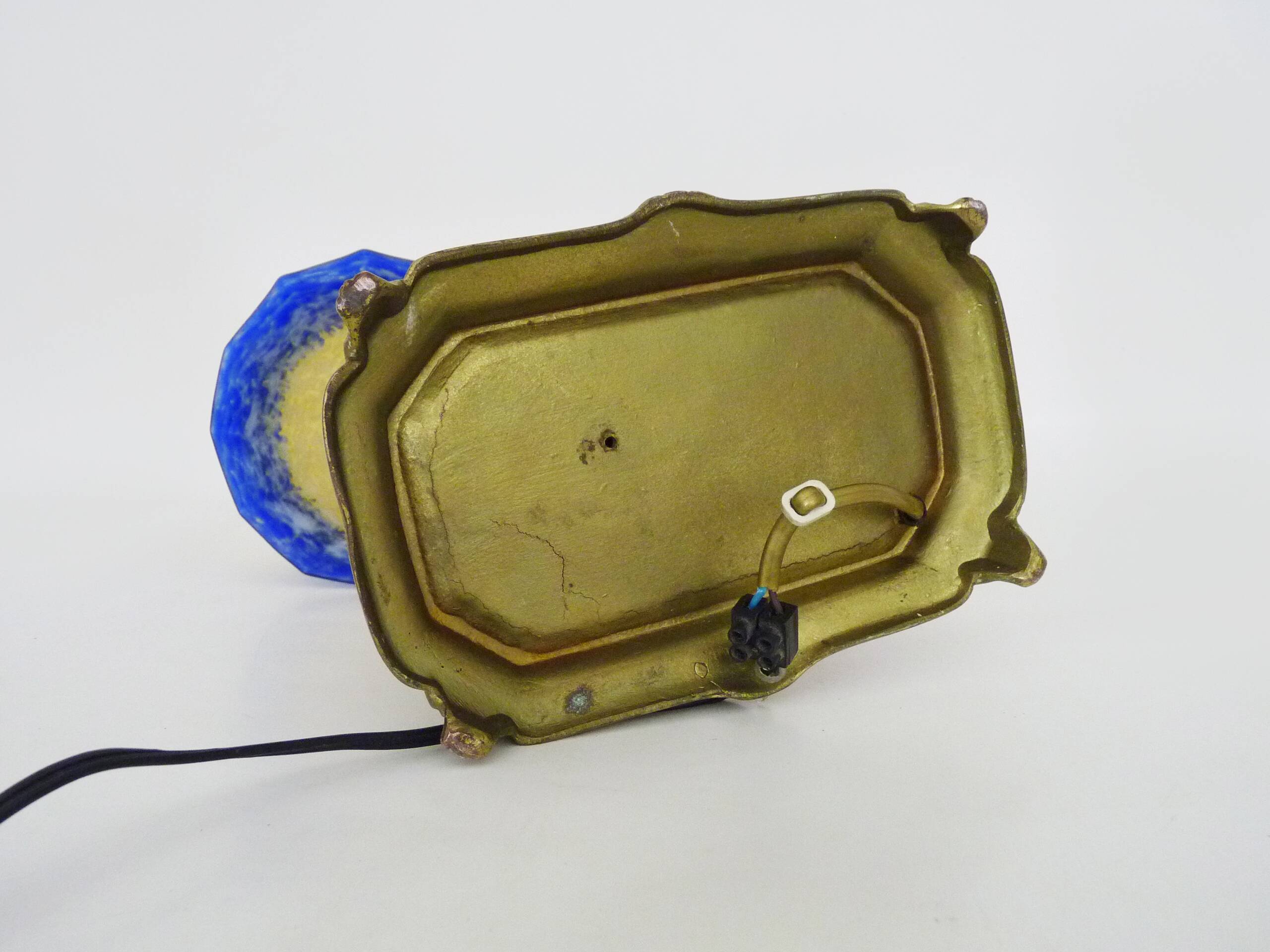 Vintage bronze table lamp featuring a painter on a mirror from the 1960s.