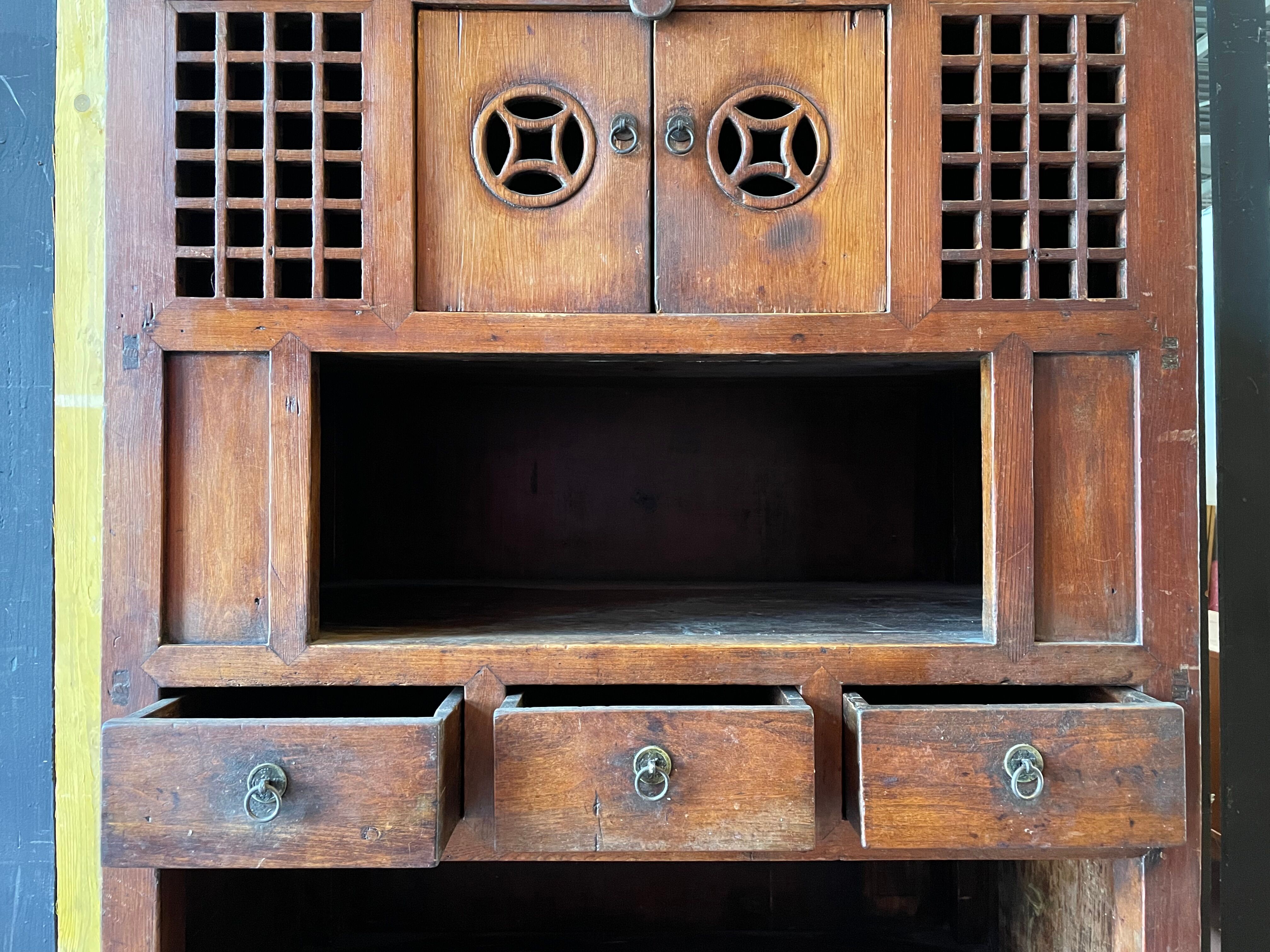 Chinese vessel cabinet 19th century in elm wood