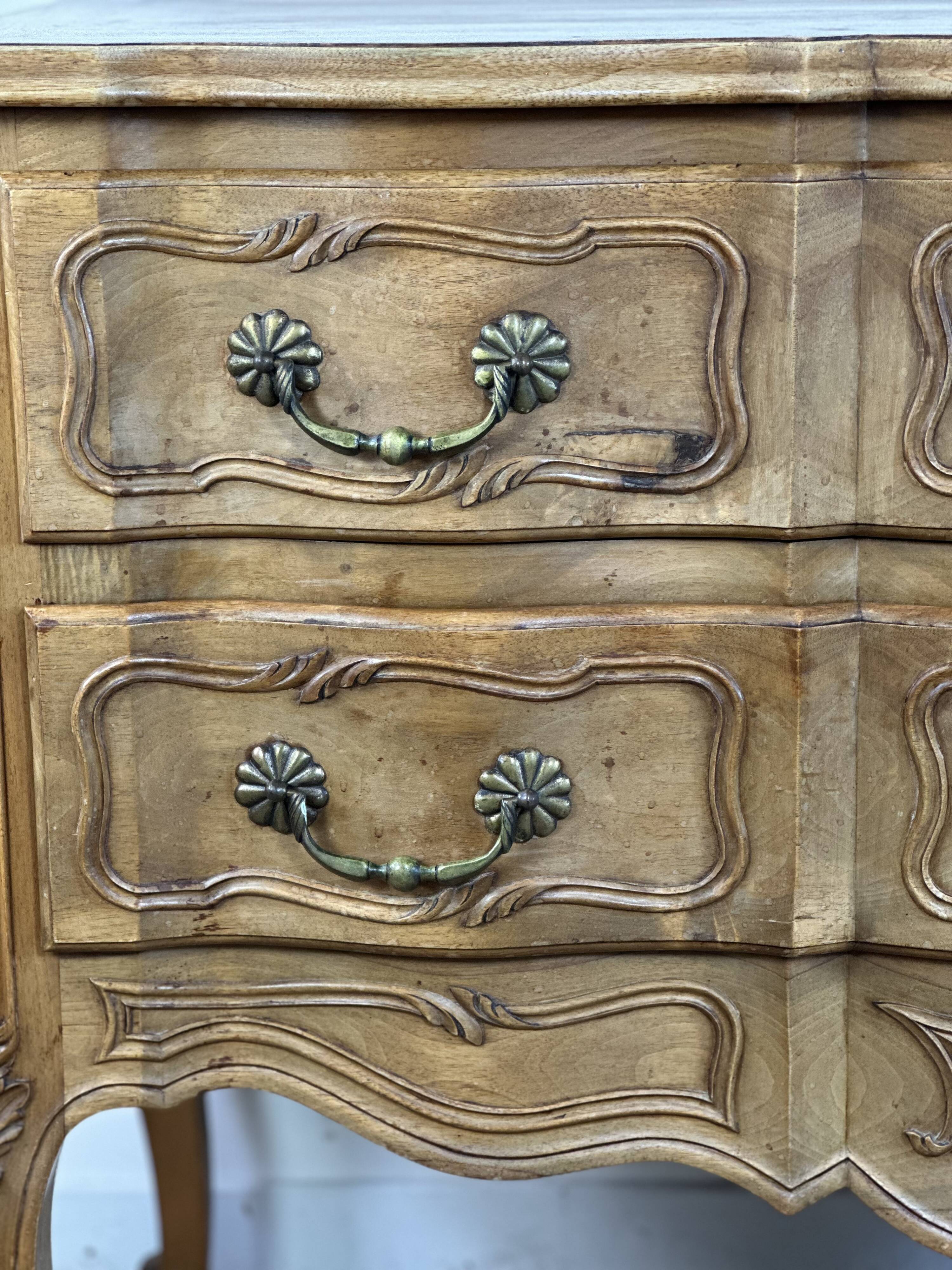 Louis XV style chest of drawers in carved wood