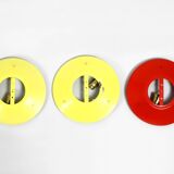 Three round 1950s wall or ceiling lamps made of metal and plexiglass shades