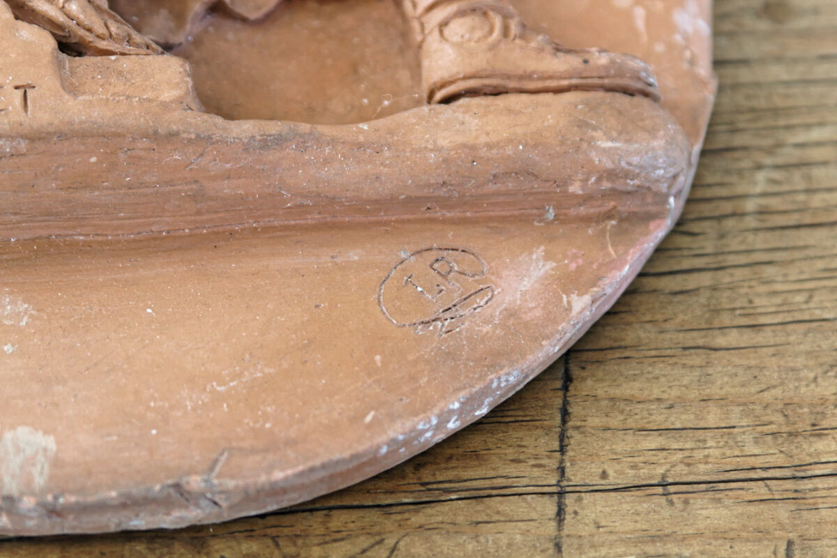 Pair of terracotta medallions