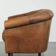 Aged sheepskin clubchair with beautiful vintage patina and comfortable seat