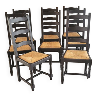 8 black solid oak chairs