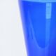 Blue glass vase with green foot