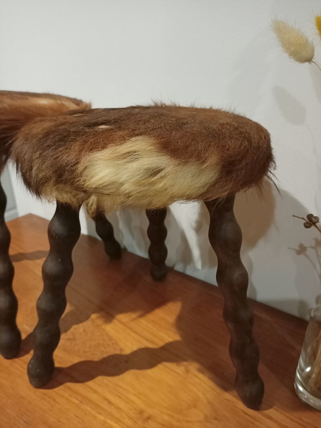 Duo of cowhide stools