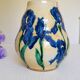 Hand-painted decorative vase with blue/purple irises.