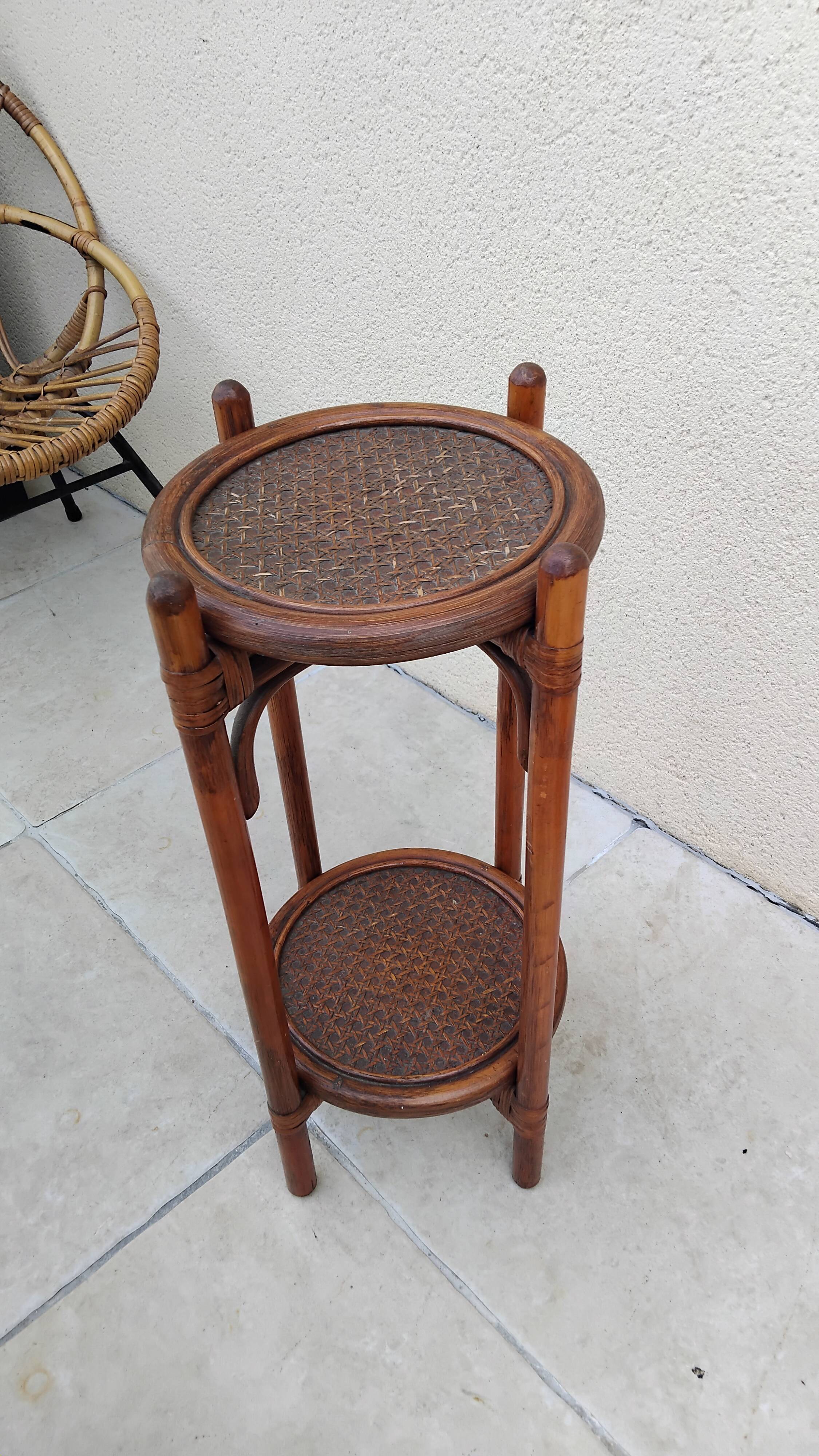 Vintage folding wooden and wicker side table.