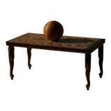 Vintage Indian teak coffee table inlaid with elephant motifs, mid-20th century.